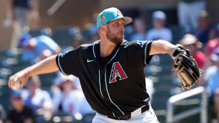 Mar 18, 2026; Salt River Pima-Maricopa, Arizona, USA; Arizona Diamondbacks pitcher Merrill Kelly (29) throws against the Chicago Cubs in the first inning at Salt River Fields at Talking Stick. Mandatory Credit: Rick Scuteri-Imagn Images Mar 18, 2026; Salt River Pima-Maricopa, Arizona, USA; Arizona Diamondbacks pitcher Merrill Kelly (29) throws against the Chicago Cubs in the first inning at Salt River Fields at Talking Stick. Mandatory Credit: Rick Scuteri-Imagn Images
