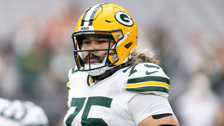 Oct 19, 2025; Glendale, Arizona, USA; Green Bay Packers guard Sean Rhyan (75) against the Arizona Cardinals at State Farm Stadium. Mandatory Credit: Mark J. Rebilas-Imagn Images
