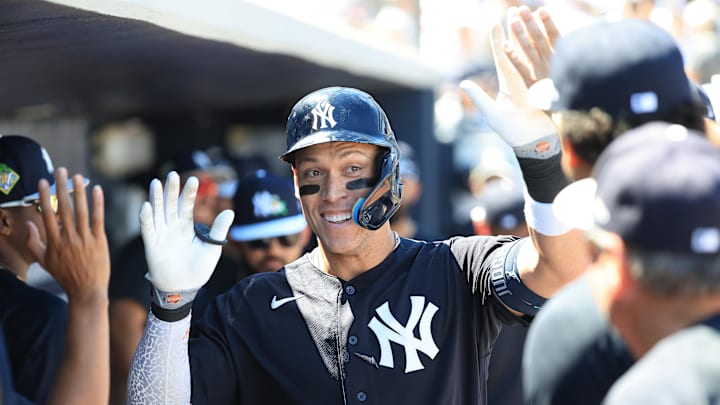 Mar 22, 2026; Tampa, Florida, USA; New York Yankees right fielder Aaron Judge (99) is congratulated after he hit a home run during the fifth inning against the Philadelphia Phillies at George M. Steinbrenner Field. Mandatory Credit: Kim Klement Neitzel-Imagn Images