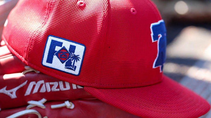 Feb 26, 2025; Dunedin, Florida, USA; Philadelphia Phillies outfielder Gabriel Rincones Jr. (85) hat sits in the dugout against the Toronto Blue Jays in the fifth inning during spring training at TD Ballpark. 