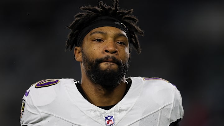 Dec 17, 2023; Jacksonville, Florida, USA; Baltimore Ravens cornerback Arthur Maulet (10) warms up before a game against the Jacksonville Jaguars at EverBank Stadium. Mandatory Credit: Nathan Ray Seebeck-Imagn Images