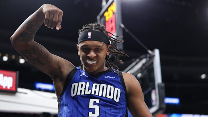 Apr 15, 2025; Orlando, Florida, USA; Orlando Magic forward Paolo Banchero (5) reacts after basket against the Atlanta Hawks in the fourth quarter at Kia Center. Mandatory Credit: Nathan Ray Seebeck-Imagn Images