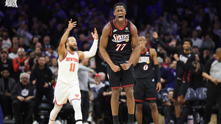 Jan 24, 2026; Philadelphia, Pennsylvania, USA; Philadelphia 76ers guard Vj Edgecombe (77) reacts to a play against the New York Knicks during the fourth quarter at Xfinity Mobile Arena. Mandatory Credit: Bill Streicher-Imagn Images