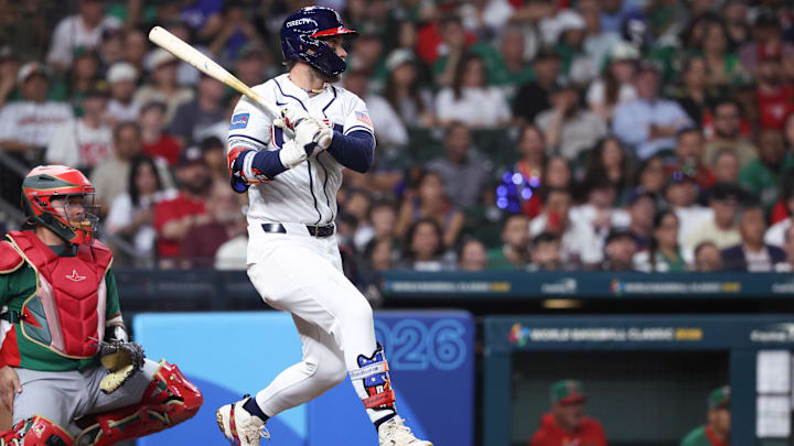 Mar 9, 2026; Houston, TX, United States; United States infielder Bryce Harper (24) hits a single in the third inning against Mexico at Daikin Park. Mandatory Credit: Troy Taormina-Imagn Images