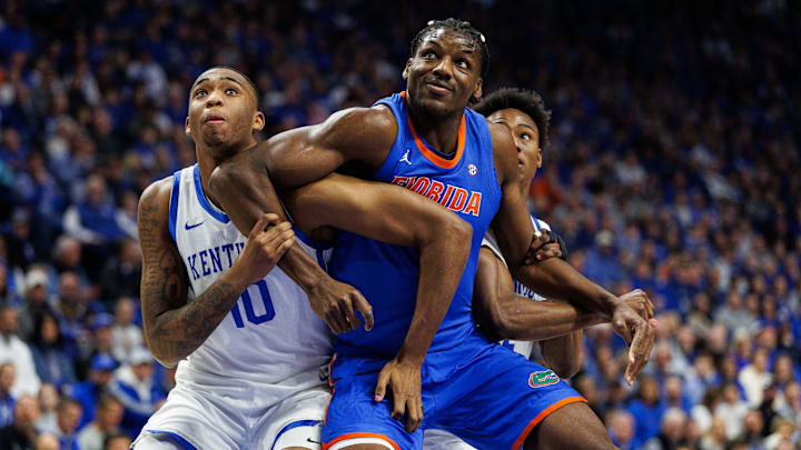Jan 4, 2025; Lexington, Kentucky, USA; Florida Gators center Rueben Chinyelu (9), Kentucky Wildcats forward Brandon Garrison (10) and guard Jaxson Robinson (2) jostle for position during the first half at Rupp Arena at Central Bank Center. Mandatory Credit: Jordan Prather-Imagn Images Jan 4, 2025; Lexington, Kentucky, USA; Florida Gators center Rueben Chinyelu (9), Kentucky Wildcats forward Brandon Garrison (10) and guard Jaxson Robinson (2) jostle for position during the first half at Rupp Arena at Central Bank Center. Mandatory Credit: Jordan Prather-Imagn Images