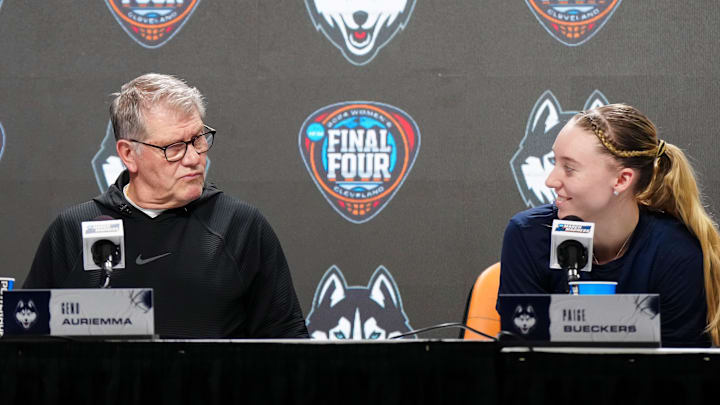 Apr 4, 2024; Cleveland, OH, USA; UConn Huskies coach Geno Auriemma (left) and guard Paige Bueckers during press conference at Rocket Mortgage FieldHouse. Mandatory Credit: Kirby Lee-Imagn Images Apr 4, 2024; Cleveland, OH, USA; UConn Huskies coach Geno Auriemma (left) and guard Paige Bueckers during press conference at Rocket Mortgage FieldHouse. Mandatory Credit: Kirby Lee-Imagn Images