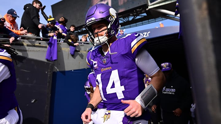 Nov 24, 2024; Chicago, Illinois, USA; Minnesota Vikings quarterback Sam Darnold (14) enters the field before the game against the Chicago Bears at Soldier Field. Mandatory Credit: Daniel Bartel-Imagn Images