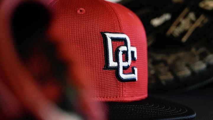 Jul 11, 2025; Milwaukee, Wisconsin, USA; General view of a Washington Nationals cap in the dugout during batting practice prior to the game against the Milwaukee Brewers at American Family Field. Mandatory Credit: Jeff Hanisch-Imagn Images Jul 11, 2025; Milwaukee, Wisconsin, USA; General view of a Washington Nationals cap in the dugout during batting practice prior to the game against the Milwaukee Brewers at American Family Field. Mandatory Credit: Jeff Hanisch-Imagn Images