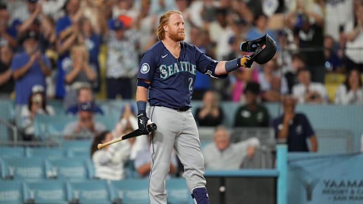 Aug 20, 2024; Los Angeles, California, USA; Seattle Mariners first baseman Justin Turner (2) acknowledges the crowd during the game against the Los Angeles Dodgers at Dodger Stadium. Mandatory Credit: Kirby Lee-Imagn Images