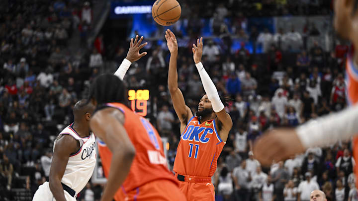 Nov 2, 2024; Inglewood, California, USA; Oklahoma City Thunder guard Isaiah Joe (11) shoots against the LA Clippers during the second half at Intuit Dome. Mandatory Credit: Jonathan Hui-Imagn Images
