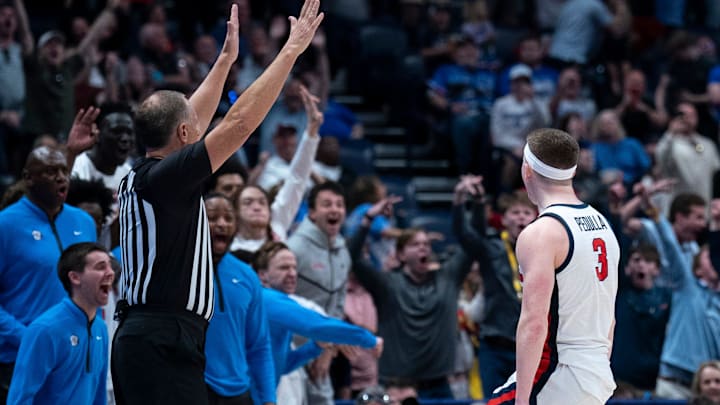 Mississippi Rebels guard Sean Pedulla (3) celebrates his game-winning shot against Arkansas during their second round game of the SEC Men's Basketball Tournament at Bridgestone Arena in Nashville, Tenn., Thursday, March 13, 2025. The Rebels advanced to the third round with the 83-80 win. Mississippi Rebels guard Sean Pedulla (3) celebrates his game-winning shot against Arkansas during their second round game of the SEC Men's Basketball Tournament at Bridgestone Arena in Nashville, Tenn., Thursday, March 13, 2025. The Rebels advanced to the third round with the 83-80 win.