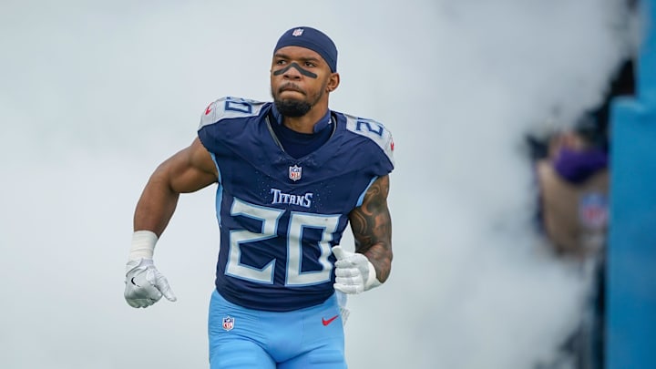 Tennessee Titans running back Tony Pollard (20) emerges from the smoke before the Titans play the Bengals at Nissan Stadium in Nashville, Tenn., Sunday, Dec. 15, 2024. Tennessee Titans running back Tony Pollard (20) emerges from the smoke before the Titans play the Bengals at Nissan Stadium in Nashville, Tenn., Sunday, Dec. 15, 2024.