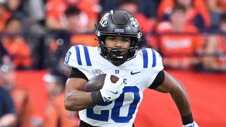 Sep 27, 2025; Syracuse, New York, USA; Duke Blue Devils running back Nate Sheppard (20) carries the ball in the second quarter against the Syracuse Orange at the JMA Wireless Dome. Mandatory Credit: Mark Konezny-Imagn Images