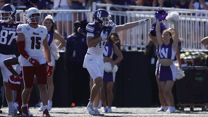 Northwestern Wildcats wide receiver Frank Covey IV signals after a first down against Miami (OH) on August 31, 2024.