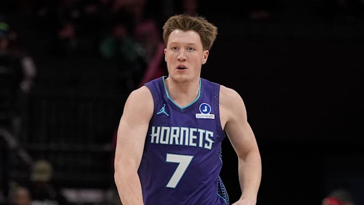 Nov 2, 2025; Charlotte, North Carolina, USA; Charlotte Hornets guard Kon Knueppel (7) brings the ball up court against the Utah Jazz during the first quarter at Spectrum Center. Mandatory Credit: Jim Dedmon-Imagn Images