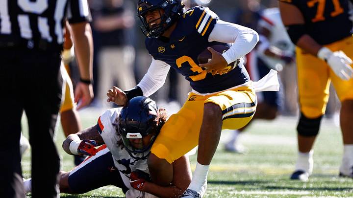 Jacob Holmes brings down California quarterback Jaron-Keawe Sagapolutele on the road Nov. 1, 2025. 