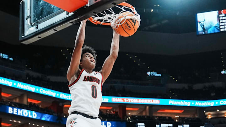 Louisville Cardinals guard Mikel Brown Jr. (0) slams down two points against Eastern Michigan Monday night, Nov. 24, 2025 at the KFC Yum! Center in Louisville, Kentucky.