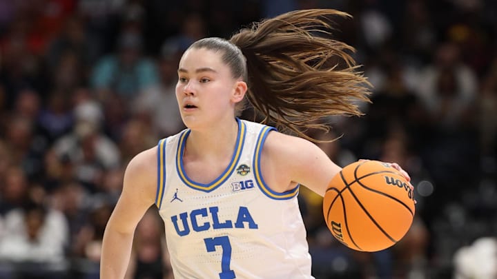Apr 4, 2025; Tampa, FL, USA;  UCLA Bruins guard Elina Aarnisalo (7) brings the ball up the court against the Connecticut Huskies during first quarter in a semifinal of the women's 2025 NCAA tournament at Amalie Arena. Mandatory Credit: Nathan Ray Seebeck-Imagn Images