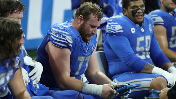 Detroit Lions center Frank Ragnow (77) on the sidelines during action against the Atlanta Falcons Sunday, Sept. 24 2023. Detroit Lions center Frank Ragnow (77) on the sidelines during action against the Atlanta Falcons Sunday, Sept. 24 2023.