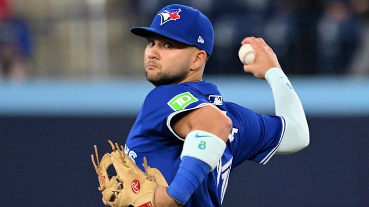 May 21, 2025; Toronto, Ontario, CAN;  Toronto Blue Jays shortstop Bo Bichette (11) warms up before playing the San Diego Padres at Rogers Centre
