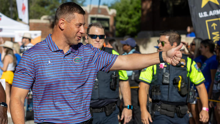 Florida Head Coach Jon Sumrall greats fans as he heads to the locker room during Gator Walk before the Orange and Blue game at Steve Spurrier Field at Ben Hill Griffin Stadium in Gainesville, FL on Saturday, April 11, 2026. [Alan Youngblood/Gainesville Sun]