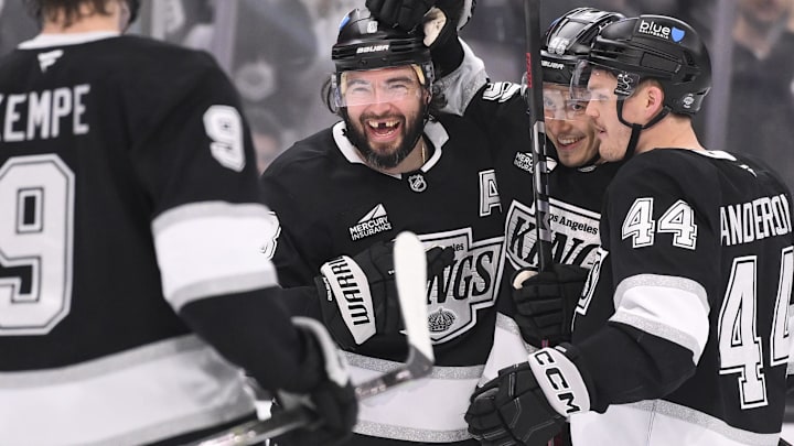 Apr 5, 2025; Los Angeles, California, USA; Los Angeles Kings defenseman Drew Doughty (8), left wing Andrei Kuzmenko (center), and defenseman Mikey Anderson (44)) are all smiles after Kuzmenko’s goal in the second period against the Edmonton Oilers at Crypto.com Arena. Mandatory Credit: Robert Hanashiro-Imagn Images