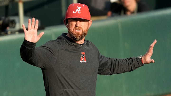 Feb 18, 2025; Tuscaloosa, Alabama, USA; Alabama baseball head coach Rob Vaughn gestures for a timeout during the game with Middle Tennessee State at Sewell-Thomas Stadium.