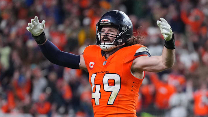 Denver Broncos linebacker Alex Singleton (49) celebrates defeating the Green Bay Packers during the fourth quarter at Empower Field at Mile High.