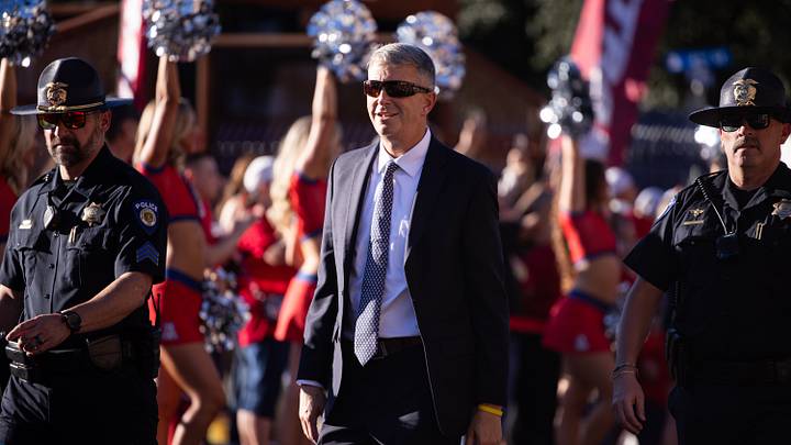 Sep 19, 2026; Tucson, Arizona, USA; Arizona Wildcats head coach Brent Brennan walks down the Wildcat Walk before the start of the game between the Arizona Wildcats and the Northern Illinois Huskies at Casino Del Sol Stadium. Sep 19, 2026; Tucson, Arizona, USA; Arizona Wildcats head coach Brent Brennan walks down the Wildcat Walk before the start of the game between the Arizona Wildcats and the Northern Illinois Huskies at Casino Del Sol Stadium.