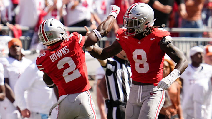 Ohio State Buckeyes safety Caleb Downs (2) and linebacker Arvell Reese (8) celebrate during the second half of the NCAA football game against the Texas Longhorns at Ohio Stadium on Aug. 30, 2025. Ohio State won 14-7.