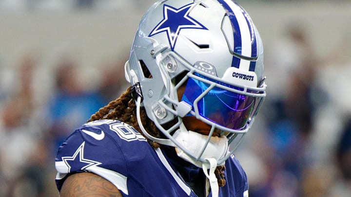 Dallas Cowboys wide receiver CeeDee Lamb warms up before the game against the Detroit Lions.