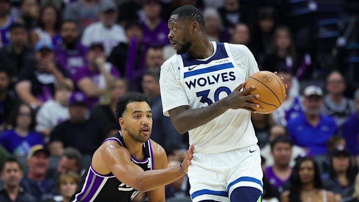 Minnesota Timberwolves forward Julius Randle controls the ball against Sacramento Kings forward Trey Lyles during the second quarter at Golden 1 Center.