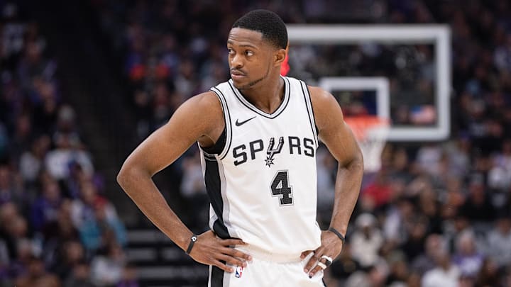 Mar 7, 2025; Sacramento, California, USA; San Antonio Spurs guard De'Aaron Fox (4) looks on during the first quarter of the game against the Sacramento Kings at Golden 1 Center.