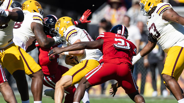 Oct 18, 2025; Tempe, Arizona, USA; Texas Tech Red Raiders linebacker David Bailey (31) sacks Arizona State Sun Devils quarterback Sam Leavitt (10) in the first half at Mountain America Stadium. Mandatory Credit: Mark J. Rebilas-Imagn Images