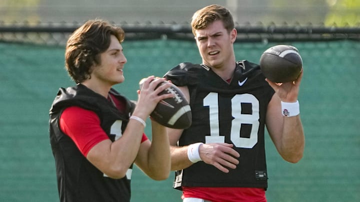 Ohio State Buckeyes quarterback Will Howard (18) talks to quarterback Julian Sayin (10) during practice for the Rose Bowl at Dignity Health Sports Park in Carson, Calif. on Dec. 30, 2024.