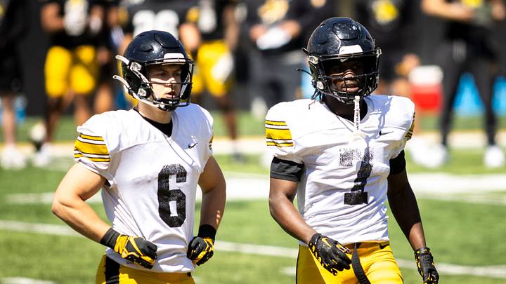 Apr 26, 2025; Iowa City, IA, USA; Iowa defensive back Zach Lutmer (6) and Iowa defensive back Rashad Godfrey Jr. (7) look to the sideline during a spring NCAA football open practice at Kinnick Stadium. Mandatory Credit: Joseph Cress/For the Register Apr 26, 2025; Iowa City, IA, USA; Iowa defensive back Zach Lutmer (6) and Iowa defensive back Rashad Godfrey Jr. (7) look to the sideline during a spring NCAA football open practice at Kinnick Stadium. Mandatory Credit: Joseph Cress/For the Register