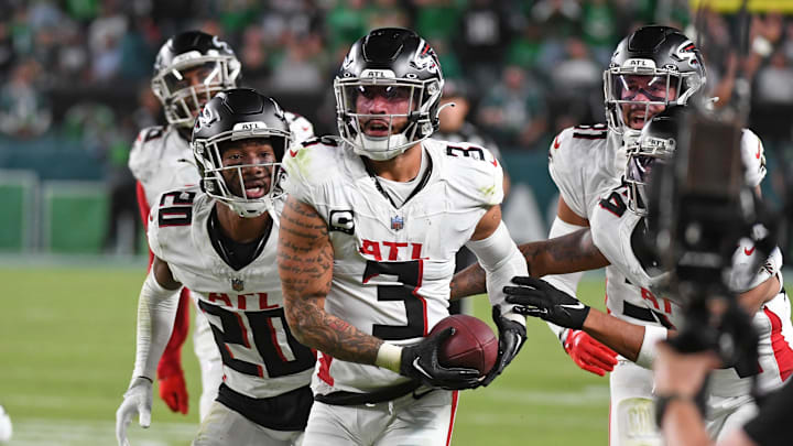 Sep 16, 2024; Philadelphia, Pennsylvania, USA; Atlanta Falcons safety Jessie Bates III (3) celebrates his interception with cornerback Dee Alford (20) on the Philadelphia Eagles last drive of the game during the fourth quarter at Lincoln Financial Field. Mandatory Credit: Eric Hartline-Imagn Images Sep 16, 2024; Philadelphia, Pennsylvania, USA; Atlanta Falcons safety Jessie Bates III (3) celebrates his interception with cornerback Dee Alford (20) on the Philadelphia Eagles last drive of the game during the fourth quarter at Lincoln Financial Field. Mandatory Credit: Eric Hartline-Imagn Images