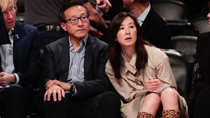 May 9, 2019; New York City, NY, USA; Taiwanese businessman Joe Tsai (left) looks on during the second half of the preseason WNBA game between the New York Liberty and the China National Team at Barclays Center.  Mandatory Credit: Vincent Carchietta-Imagn Images