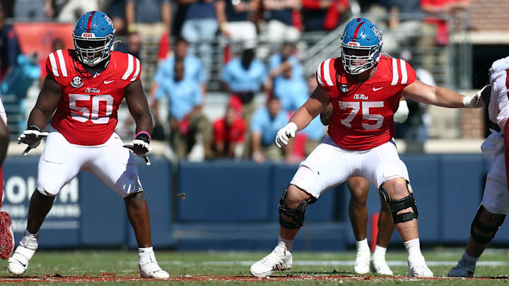Oct 11, 2025; Oxford, Mississippi, USA; Mississippi Rebels offensive lineman Jayden Williams (50) and  offensive lineman Patrick Kutas (75) block during the fourth quarter against the Washington State Cougars at Vaught-Hemingway Stadium. Mandatory Credit: Petre Thomas-Imagn Images