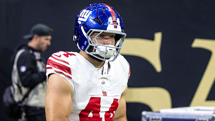 Oct 5, 2025; New Orleans, Louisiana, USA; New York Giants running back Cam Skattebo (44) runs out the tunnel against New Orleans Saints during warmups at Caesars Superdome. Oct 5, 2025; New Orleans, Louisiana, USA; New York Giants running back Cam Skattebo (44) runs out the tunnel against New Orleans Saints during warmups at Caesars Superdome.