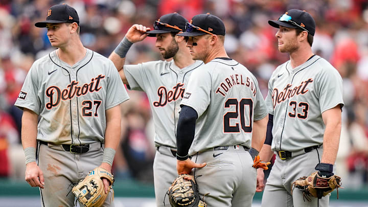 From left, Detroit Tigers shortstop Trey Sweeney (27), third baseman Matt Vierling (8), first baseman Spencer Torkelson (20) and second base Colt Keith (33) watch during a pitching change during the seventh inning at Game 5 of ALDS at Progressive Field in Cleveland, Ohio on Saturday, Oct. 12, 2024