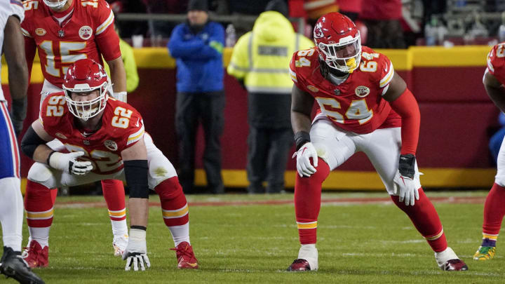 Dec 10, 2023; Kansas City, Missouri, USA; Kansas City Chiefs guard Joe Thuney (62) and offensive tackle Wanya Morris (64) at the line of scrimmage against the Buffalo Bills during the game at GEHA Field at Arrowhead Stadium. Mandatory Credit: Denny Medley-USA TODAY Sports Dec 10, 2023; Kansas City, Missouri, USA; Kansas City Chiefs guard Joe Thuney (62) and offensive tackle Wanya Morris (64) at the line of scrimmage against the Buffalo Bills during the game at GEHA Field at Arrowhead Stadium. Mandatory Credit: Denny Medley-USA TODAY Sports