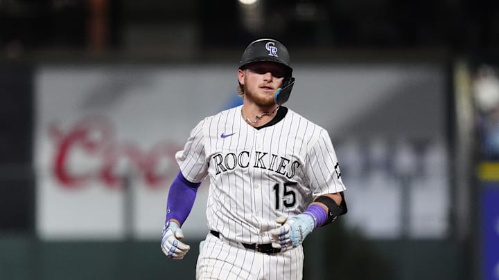 Sep 2, 2025; Denver, Colorado, USA; Colorado Rockies catcher Hunter Goodman (15) runs off a two run home run in the seventh inning against the San Francisco Giants at Coors Field. 