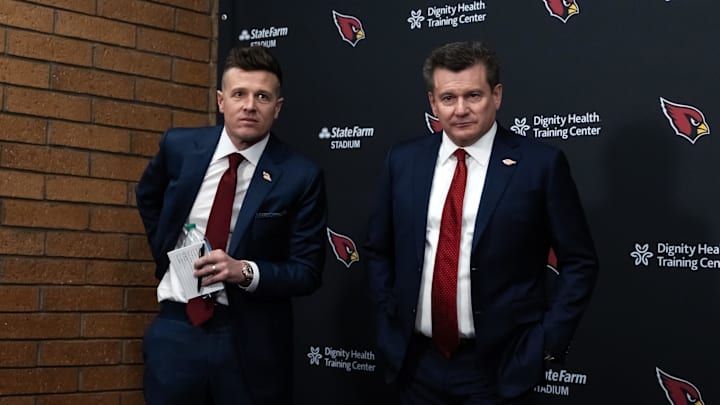 Feb 3, 2026; Tempe, AZ, USA; Arizona Cardinals owner Michael Bidwill (right) and head coach Mike LaFleur at the introductory press conference at the Cardinals training facility. Mandatory Credit: Mark J. Rebilas-Imagn Images