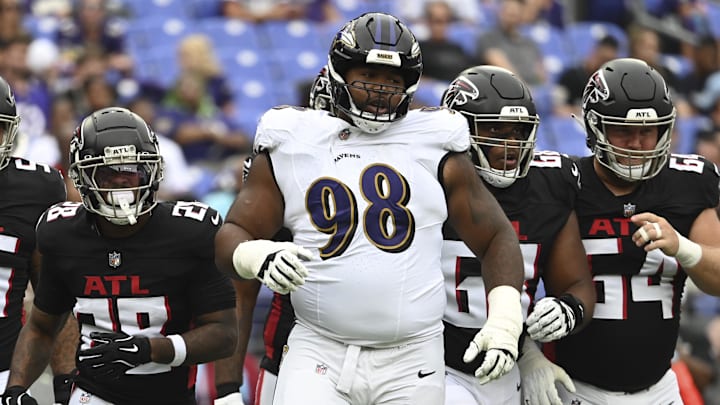 Baltimore Ravens defensive tackle Travis Jones (98) reacts during the first half against the Atlanta Falcons at M&T Bank Stadium. 