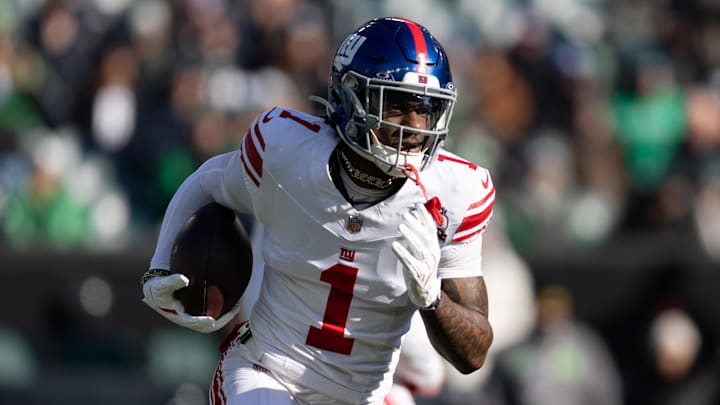 Jan 5, 2025; Philadelphia, Pennsylvania, USA; New York Giants wide receiver Malik Nabers (1) runs with the ball against the Philadelphia Eagles during the first quarter at Lincoln Financial Field. Mandatory Credit: Bill Streicher-Imagn Images Jan 5, 2025; Philadelphia, Pennsylvania, USA; New York Giants wide receiver Malik Nabers (1) runs with the ball against the Philadelphia Eagles during the first quarter at Lincoln Financial Field. Mandatory Credit: Bill Streicher-Imagn Images