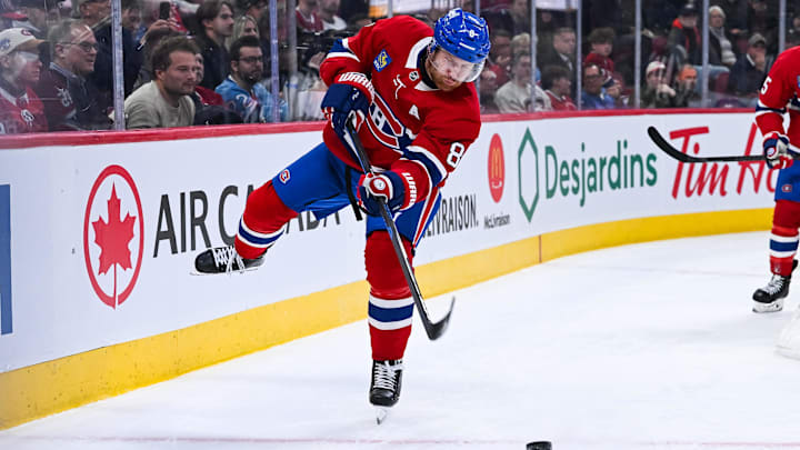 Nov 11, 2025; Montreal, Quebec, CAN; Montreal Canadiens defenseman Mike Matheson (8) shoots the puck away against the Los Angeles Kings during the second period at Bell Centre. Mandatory Credit: David Kirouac-Imagn Images Nov 11, 2025; Montreal, Quebec, CAN; Montreal Canadiens defenseman Mike Matheson (8) shoots the puck away against the Los Angeles Kings during the second period at Bell Centre. Mandatory Credit: David Kirouac-Imagn Images