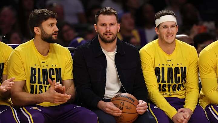 Feb 9, 2026; Los Angeles, California, USA; Los Angeles Lakers guard Luka Doncic (middle) watches a game against the Oklahoma City Thunder at Crypto.com Arena. Mandatory Credit: Kiyoshi Mio-Imagn Images Feb 9, 2026; Los Angeles, California, USA; Los Angeles Lakers guard Luka Doncic (middle) watches a game against the Oklahoma City Thunder at Crypto.com Arena. Mandatory Credit: Kiyoshi Mio-Imagn Images