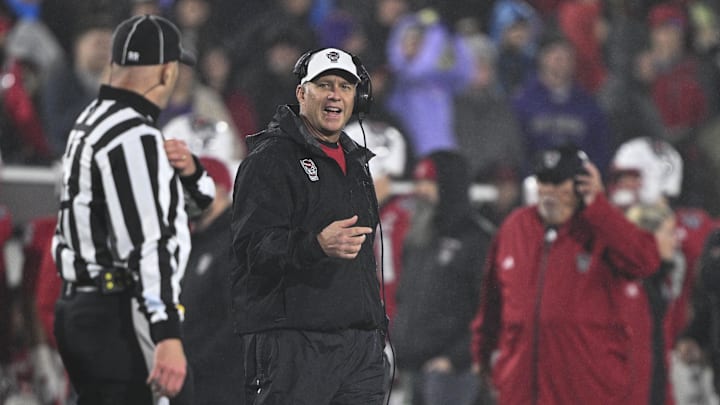 Dec 28, 2024; Annapolis, MD, USA;  North Carolina State Wolfpack head coach Dave Doeren reacts after a play during the first half of the Go Bowling Military Bowl at Navy-Marine Corps Memorial Stadium. Mandatory Credit: Tommy Gilligan-Imagn Images