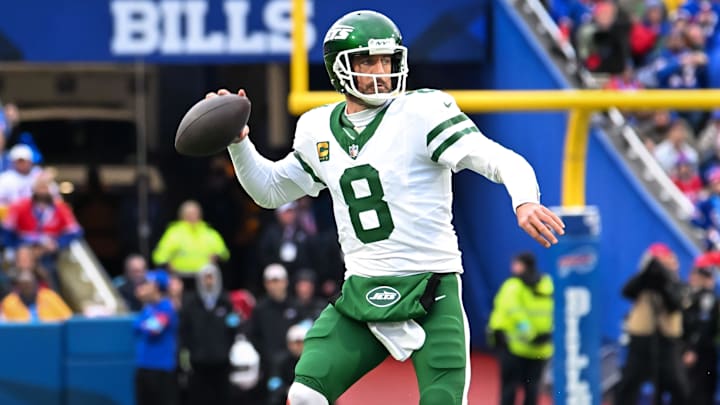 Dec 29, 2024; Orchard Park, New York, USA; New York Jets quarterback Aaron Rodgers (8) throws a pass in the first quarter against the Buffalo Bills at Highmark Stadium. Mandatory Credit: Mark Konezny-Imagn Images